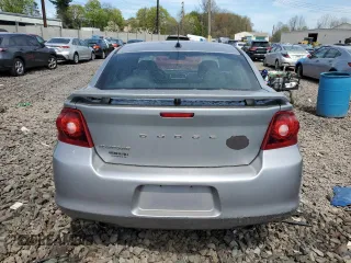 2014 Dodge Avenger SXT z VIN 1C3CDZCG6EN131544, wystawiony jako Copart lot #53955425 z przebiegiem 118 977 mil mil oraz Szkoda całkowita • Salvage title. Historia ofert i sprzedaży dostępna na DreamBid. Obrazek 6.