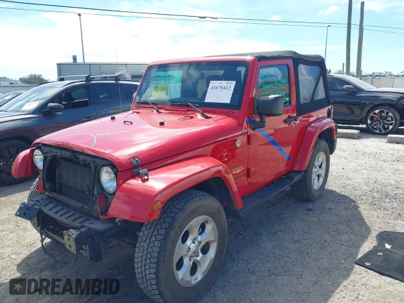 2014 Jeep Wrangler Sahara with VIN 1C4AJWBG0EL109773, listed as a IAAI auction lot 41678412 with 12,264 mi miles and . Bid and sale history available at DreamBid. Image 2.