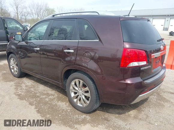 2012 Kia Sorento SX with VIN 5XYKW4A2XCG187647, listed as a IAAI auction lot 42020667 with 210,689 mi miles. Bid and sale history available at carsss.com. Image 3.