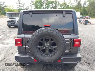 2021 Jeep Wrangler Unlimited Willys с VIN 1C4HJXDG2MW646904, выставлен на аукционе IAAI как лот 42267506 с пробегом 55 530 миль миль и . История ставок и продаж доступна на DreamBid. Изображение 17.
