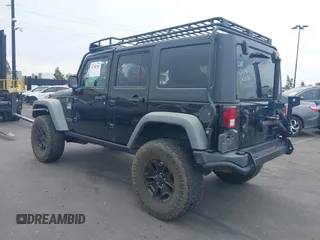 2014 Jeep Wrangler Unlimited Rubicon with VIN 1C4BJWFGXEL172622, listed as a IAAI auction lot 41782796 with 67,594 mi miles. Bid and sale history available at carsss.com. Image 3.