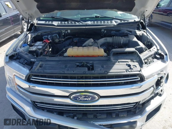 2018 Ford F-150 XL with VIN 1FTEW1E53JKD72694, listed as a IAAI auction lot 41740655 with 150,330 mi miles. Bid and sale history available at carsss.com. Image 10.