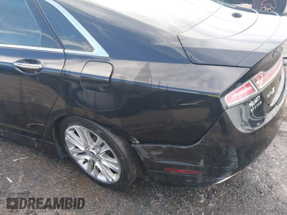 2014 Lincoln MKZ with VIN 3LN6L2G91ER814890, listed as a IAAI auction lot 41651789 with 143,445 mi miles and . Bid and sale history available at DreamBid. Image 19.