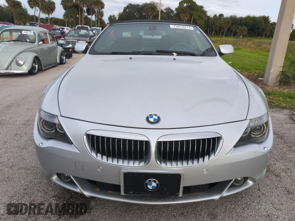 2006 BMW 6 Series 650Ci z VIN WBAEK13406CN72159, wystawiony jako Copart lot #75078214 z przebiegiem Nie podano mil oraz Szkoda całkowita • Salvage title. Historia ofert i sprzedaży dostępna na DreamBid. Obrazek 5.