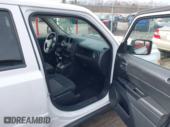 2015 Jeep Patriot Sport with VIN 1C4NJRBBXFD317811, listed as a IAAI auction lot 41579467 with 107,002 mi miles and . Bid and sale history available at carsss.com. Image 5.