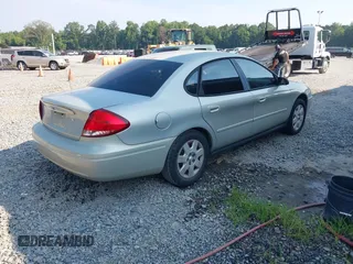 2005 Ford Taurus SE with VIN 1FAFP53205A131307, listed as a IAAI auction lot 42678385 with 198,491 mi miles and . Bid and sale history available at DreamBid. Image 4.