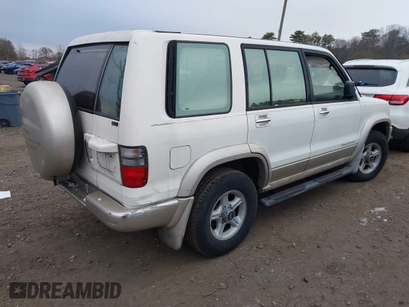 2002 Isuzu Trooper S with VIN JACDJ58X227J02390, listed as a IAAI auction lot 41125455 with 177,350 mi miles and . Bid and sale history available at DreamBid. Image 4.