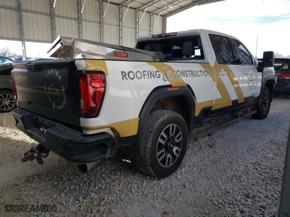 2022 GMC Sierra 2500HD AT4 with VIN 1GT49PEY5NF124185, listed as a Copart auction lot 83973154 with 96,404 mi miles and Salvage Title. Bid and sale history available at carsss.com. Image 3.