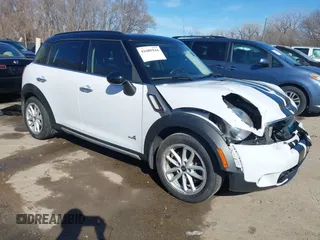 2016 MINI Countryman S with VIN WMWZC5C55GWU21896, listed as a IAAI auction lot 41689544 with 84,024 mi miles and . Bid and sale history available at DreamBid. Image 1.