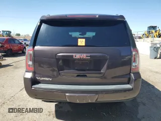 2015 GMC Yukon SLT z VIN 1GKS1BKC5FR689549, wystawiony jako Copart lot #56747385 z przebiegiem 102 856 mil mil oraz Szkoda całkowita • Salvage title. Historia ofert i sprzedaży dostępna na DreamBid. Obrazek 6.