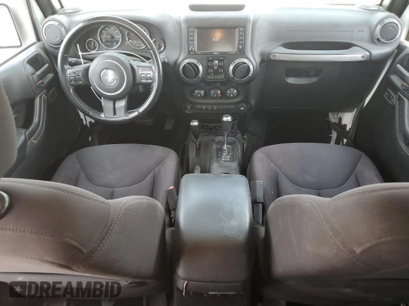 2015 Jeep Wrangler Unlimited Sport with VIN 1C4BJWDG2FL545561, listed as a Copart auction lot 60574045 with 83,592 mi miles and Salvage title. Bid and sale history available at DreamBid. Image 8.