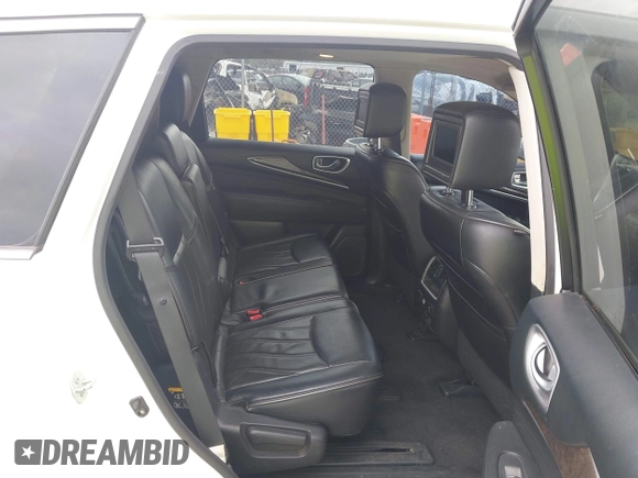 2013 Infiniti JX35 with VIN 5N1AL0MM5DC325574, listed as a IAAI auction lot 42011771 with 173,656 mi miles and . Bid and sale history available at DreamBid. Image 8.