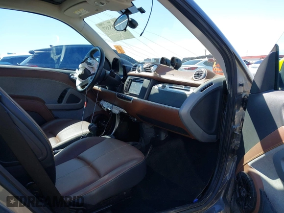 2014 Smart fortwo Pure с VIN WMEEJ3BA3EK741265, выставлен на аукционе IAAI как лот 42185357 с пробегом 56 753 миль миль и . История ставок и продаж доступна на DreamBid. Изображение 5.