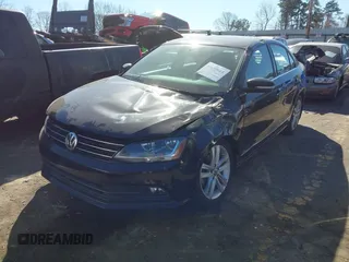 2017 Volkswagen Jetta SEL z VIN 3VWL17AJ5HM246543, wystawiony jako IAAI lot #41650614 z przebiegiem 112 168 mil mil oraz . Historia ofert i sprzedaży dostępna na DreamBid. Obrazek 2.