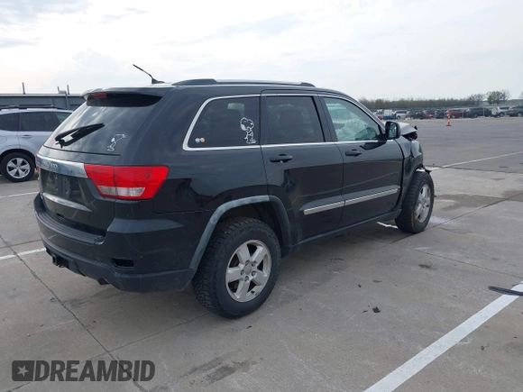 2011 Jeep Grand Cherokee Laredo z VIN 1J4RR4GG8BC504878, wystawiony jako IAAI lot #42097973 z przebiegiem 190 583 mil mil oraz . Historia ofert i sprzedaży dostępna na DreamBid. Obrazek 4.