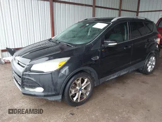 2014 Ford Escape Titanium z VIN 1FMCU0J96EUA84108, wystawiony jako IAAI lot #42114002 z przebiegiem 176 735 mil mil oraz . Historia ofert i sprzedaży dostępna na DreamBid. Obrazek 17.