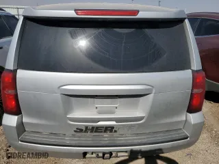 2019 Chevrolet Tahoe Commercial with VIN 1GNLCDEC9KR172936, listed as a Copart auction lot 68144714 with 129,325 mi miles and Salvage Title. Bid and sale history available at carsss.com. Image 6.