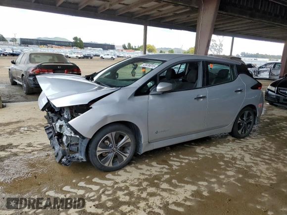 2018 Nissan LEAF SL with VIN 1N4AZ1CPXJC309389, listed as a Copart auction lot 43636015 with 76,070 mi miles and Clean Title. Bid and sale history available at DreamBid. Image 1.