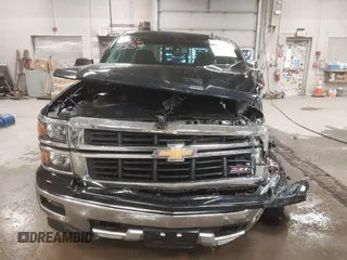 2015 Chevrolet Silverado 1500 LT with VIN 1GCVKREC2FZ417244, listed as a IAAI auction lot 41267554 with 87,735 mi miles and . Bid and sale history available at DreamBid. Image 17.