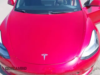 2021 Tesla Model 3 Long Range with VIN 5YJ3E1EB4MF936743, listed as a IAAI auction lot 42154322 with 46,983 mi miles and . Bid and sale history available at DreamBid. Image 10.
