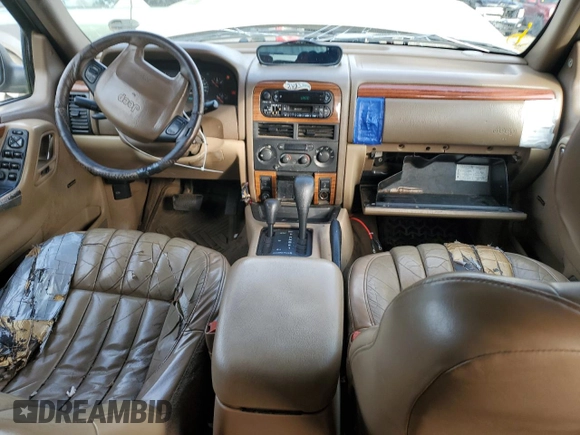 1999 Jeep Grand Cherokee Limited with VIN 1J4GW68N2XC581746, listed as a Copart auction lot 45413775 with 284,226 mi miles and Salvage Title. Bid and sale history available at carsss.com. Image 8.