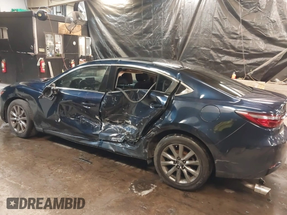 2018 Mazda Mazda6 Sport with VIN JM1GL1UMXJ1330989, listed as a IAAI auction lot 41355353 with 52,869 mi miles. Bid and sale history available at carsss.com. Image 6.