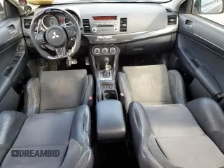 2008 Mitsubishi Lancer Evolution MR with VIN JA3AW56V18U050699, listed as a Copart auction lot 58567274 with 79,267 mi miles and Salvage Title. Bid and sale history available at DreamBid. Image 8.
