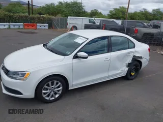 2012 Volkswagen Jetta SE z VIN 3VWDP7AJ7CM350057, wystawiony jako IAAI lot #42499732 z przebiegiem 92 203 mil mil oraz . Historia ofert i sprzedaży dostępna na DreamBid. Obrazek 6.