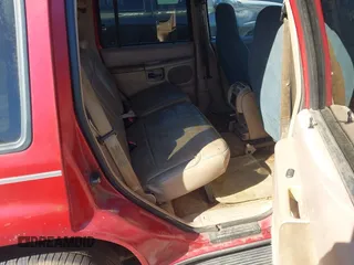 1998 Ford Explorer z VIN 1FMZU32X2WUC12399, wystawiony jako IAAI lot #41627104 z przebiegiem 237 148 mil mil oraz . Historia ofert i sprzedaży dostępna na DreamBid. Obrazek 8.