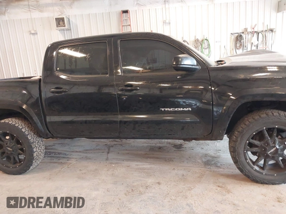 2017 Toyota Tacoma SR5 with VIN 5TFCZ5AN0HX053441, listed as a IAAI auction lot 42376148 with 100,996 mi miles and . Bid and sale history available at DreamBid. Image 13.