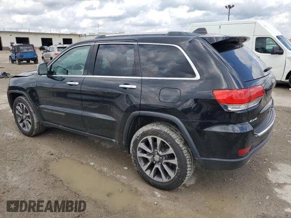 2018 Jeep Grand Cherokee Limited with VIN 1C4RJFBTXJC165584, listed as a Copart auction lot 54947835 with 69,403 mi miles and Non repairable. Bid and sale history available at DreamBid. Image 2.