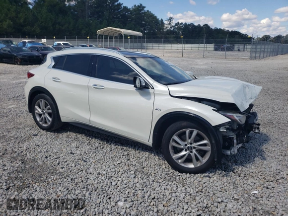 2019 Infiniti QX30 Luxe with VIN SJKCH5CP8KA011169, listed as a Copart auction lot 74402124 with 80,377 mi miles and Salvage title. Bid and sale history available at DreamBid. Image 4.