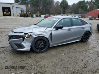 2022 Honda Civic Sport z VIN 2HGFE2F5XNH525548, wystawiony jako Copart lot #51857515 z przebiegiem 71 472 mil mil oraz Szkody całkowita. Historia ofert i sprzedaży dostępna na DreamBid. Obrazek 1.