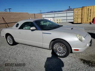2005 Ford Thunderbird 50th Anniversary with VIN 1FAHP69A85Y106689, listed as a Copart auction lot 41338295 with 104,128 mi miles and Clean Title. Bid and sale history available at DreamBid. Image 4.