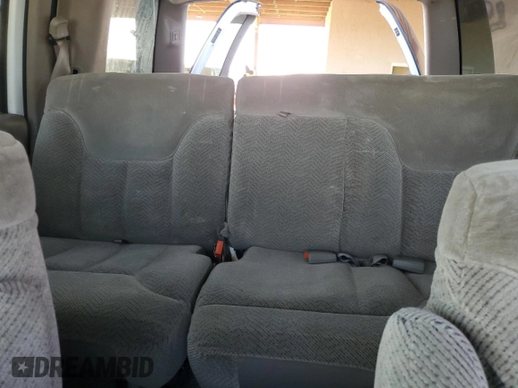 1999 GMC Yukon with VIN 1GKEC13R0XJ811710, listed as a Copart auction lot 43014995 with 311,948 mi miles and Salvage Title. Bid and sale history available at carsss.com. Image 10.