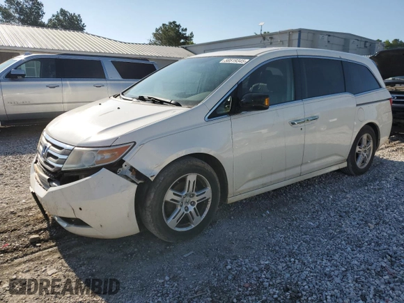 2013 Honda Odyssey Touring with VIN 5FNRL5H90DB003003, listed as a Copart auction lot 58519345 with 259,383 mi miles and Salvage title. Bid and sale history available at DreamBid. Image 1.