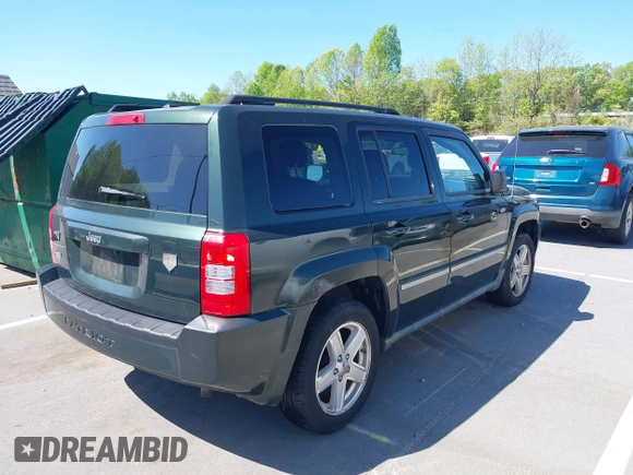 2010 Jeep Patriot Sport with VIN 1J4NF1GB3AD623781, listed as a IAAI auction lot 42053570 with 87,253 mi miles. Bid and sale history available at carsss.com. Image 4.