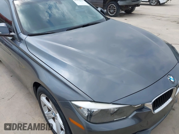 2013 BMW 3 Series 320i with VIN WBA3B1C53DK128602, listed as a IAAI auction lot 41952771 with 103,564 mi miles and . Bid and sale history available at carsss.com. Image 6.
