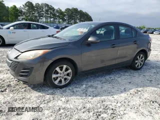 2010 Mazda 3 i Touring with VIN JM1BL1SF8A1107915, listed as a Copart auction lot 54670675 with 196,990 mi miles and Salvage Title. Bid and sale history available at DreamBid. Image 1.