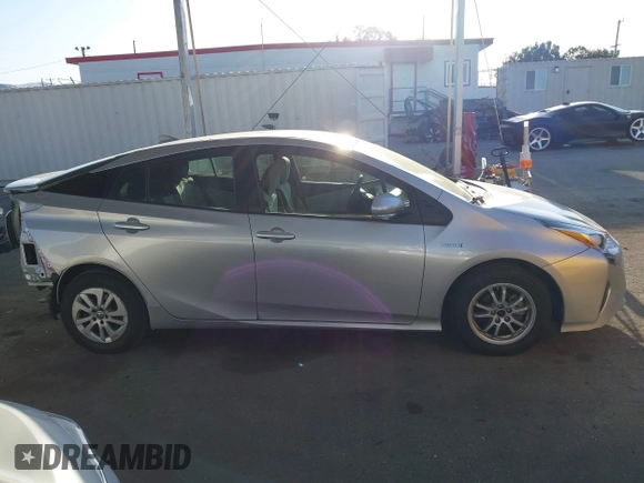 2016 Toyota Prius Two with VIN JTDKBRFU4G3014560, listed as a IAAI auction lot 41968960 with 101,530 mi miles and . Bid and sale history available at DreamBid. Image 14.