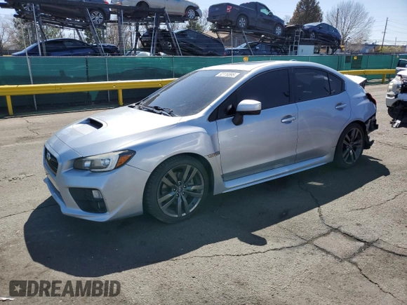 2016 Subaru WRX Limited with VIN JF1VA1J65G9818699, listed as a Copart auction lot 52116595 with 123,247 mi miles and Salvage title. Bid and sale history available at DreamBid. Image 1.