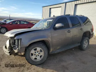 2012 Chevrolet Tahoe LS with VIN 1GNSCAE02CR292076, listed as a Copart auction lot 80347724 with 256,438 mi miles and Salvage title. Bid and sale history available at DreamBid. Image 1.