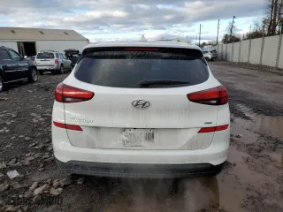 2019 Hyundai Tucson SE with VIN KM8J2CA48KU980022, listed as a Copart auction lot 89057495 with 36,813 mi miles and Salvage Title. Bid and sale history available at carsss.com. Image 6.