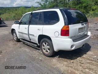 2003 GMC Envoy SLT with VIN 1GKDS13S632266506, listed as a IAAI auction lot 42149049 with 259,884 mi miles and . Bid and sale history available at DreamBid. Image 3.