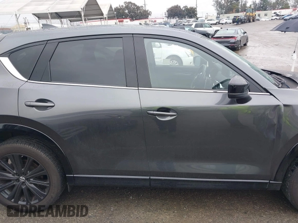 2022 Mazda CX-5 2.5 Turbo with VIN JM3KFBAY8N0647204, listed as a IAAI auction lot 41567490 with 40,396 mi miles and . Bid and sale history available at carsss.com. Image 13.