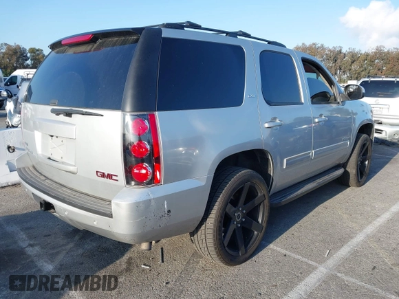 2010 GMC Yukon SLT with VIN 1GKUCCE00AR255901, listed as a IAAI auction lot 42149960 with 196,014 mi miles. Bid and sale history available at carsss.com. Image 4.