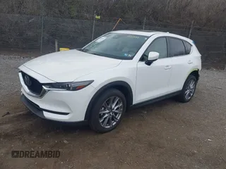 2020 Mazda CX-5 Grand Touring with VIN JM3KFBDM5L0731373, listed as a IAAI auction lot 41900567 with 31,268 mi miles and . Bid and sale history available at DreamBid. Image 17.