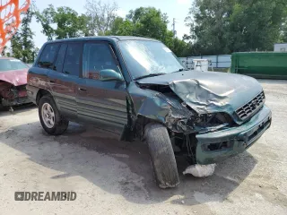 2000 Toyota RAV4 с VIN JT3HP10V3Y7165886, выставлен на аукционе Copart как лот 55946715 с пробегом 136 518 миль миль и Списание • Salvage title. История ставок и продаж доступна на DreamBid. Изображение 4.