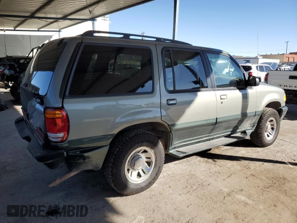 1999 Mercury Mountaineer z VIN 4M2ZU55P0XUJ06301, wystawiony jako Copart lot #81357924 z przebiegiem 181 750 mil mil oraz Szkody całkowita. Historia ofert i sprzedaży dostępna na DreamBid. Obrazek 3.