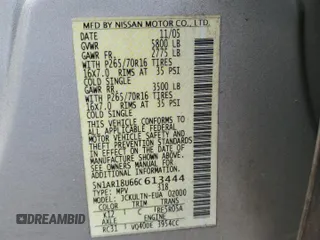 2006 Nissan Pathfinder SE z VIN 5N1AR18U66C613444, wystawiony jako Copart lot #59494365 z przebiegiem 218 903 mil mil oraz Czysty tytuł • Clean title. Historia ofert i sprzedaży dostępna na DreamBid. Obrazek 13.